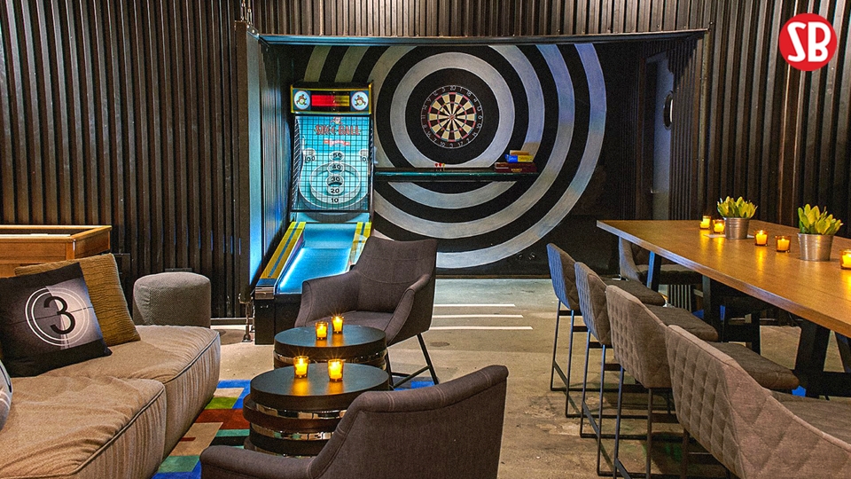 Entertainment Lounge with Corrugated Metal Walls for Industrial Decor