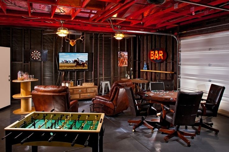 Entertainment Room with Red Exposed Ceiling for Garage Man Cave Layouts