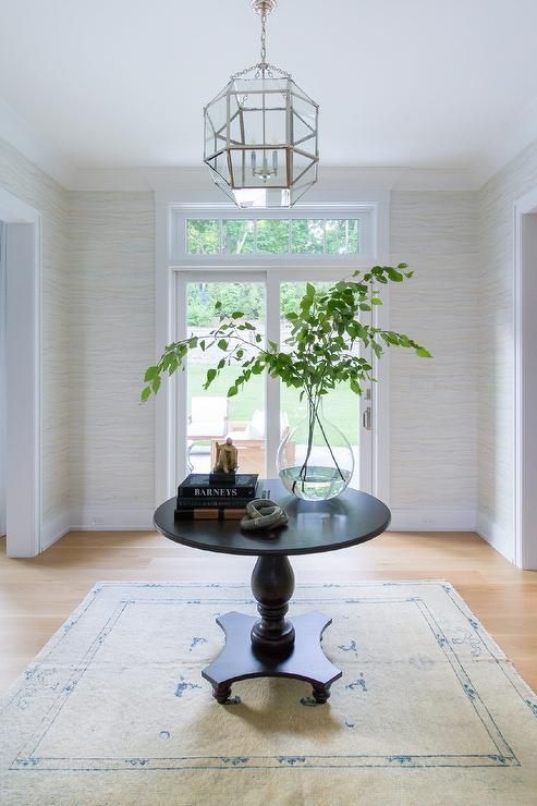 Entry Table Against Textured Grasscloth Wallpaper Walls