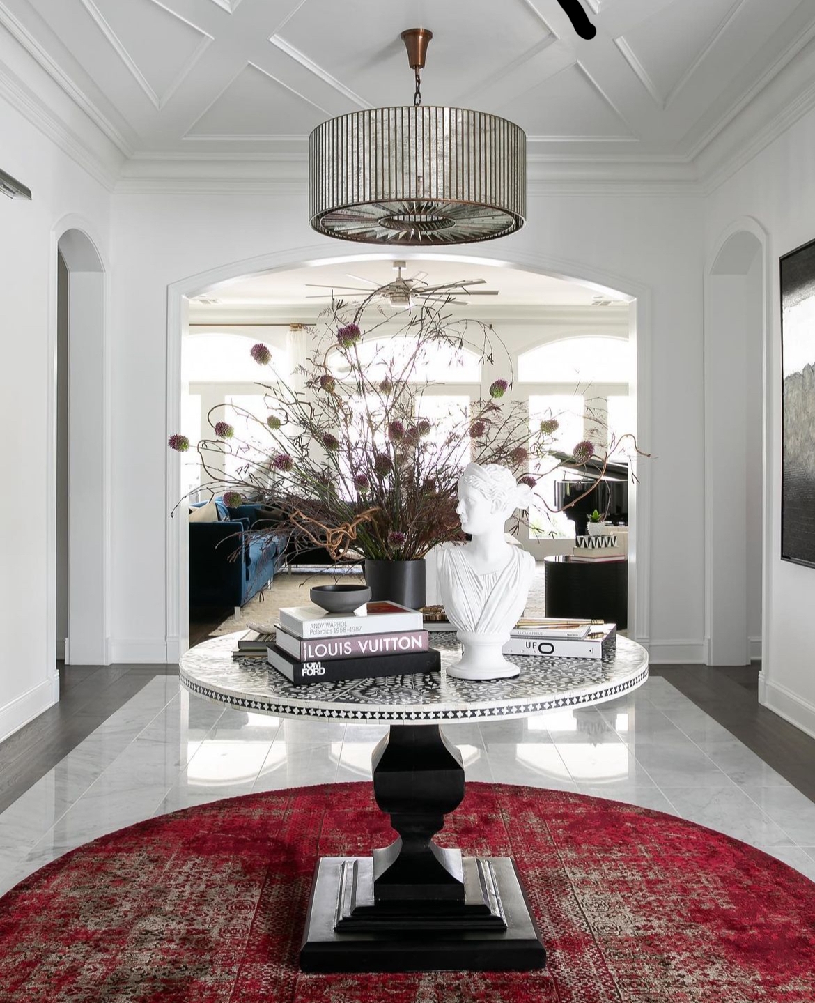 Entry Table Featuring Bone Inlay Pattern And Black Pedestal