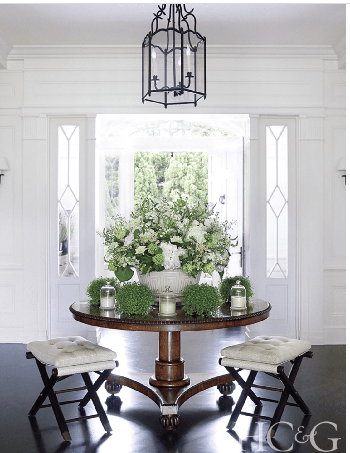 Entry Table Set With Tufted X-Base Stools And Lantern Light