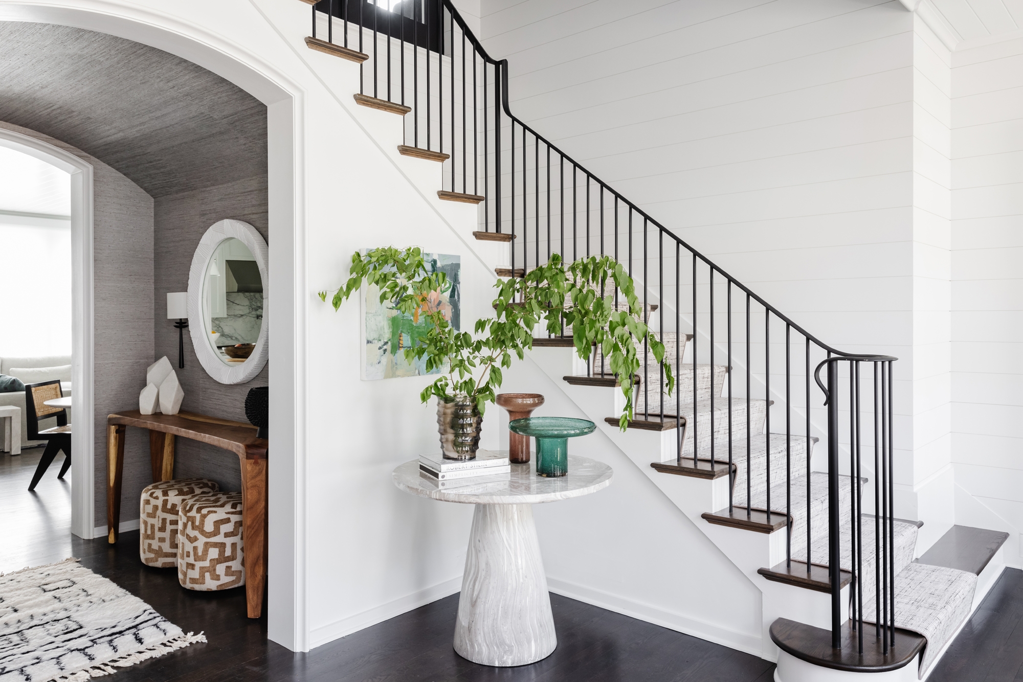 Entry Table With Stone Pedestal And Wrought Iron Railings