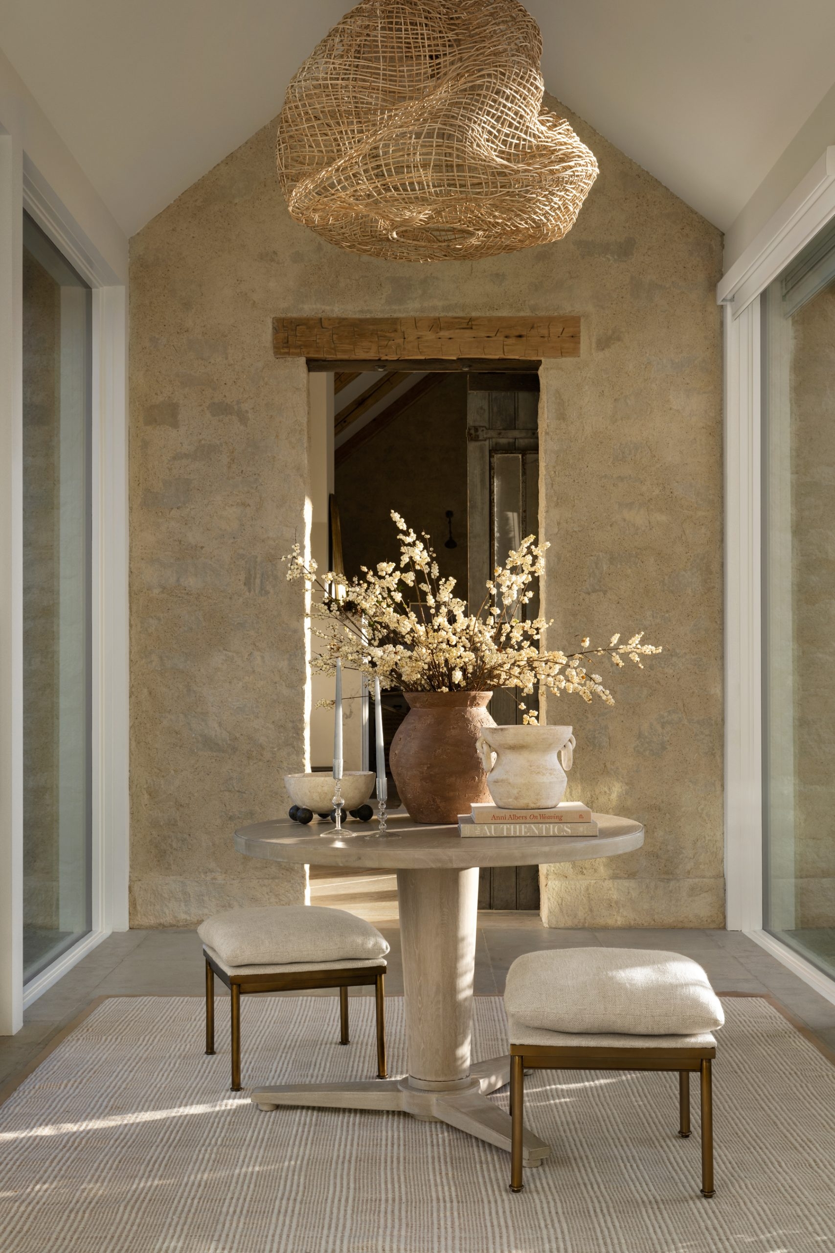 Entryway Table In Stone Wall Foyer With Woven Pendant Light
