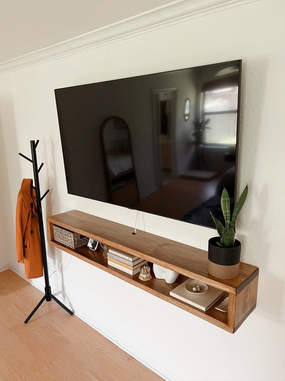 Floating TV Console Featuring Cable Management Hole