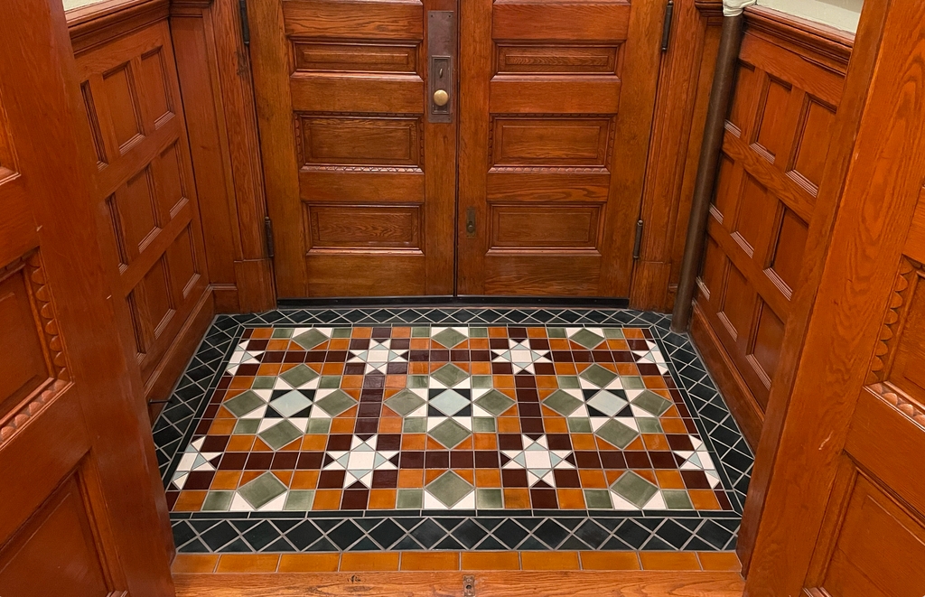 Floor Tile showcasing Star Motif Tile Rug Inlay Design