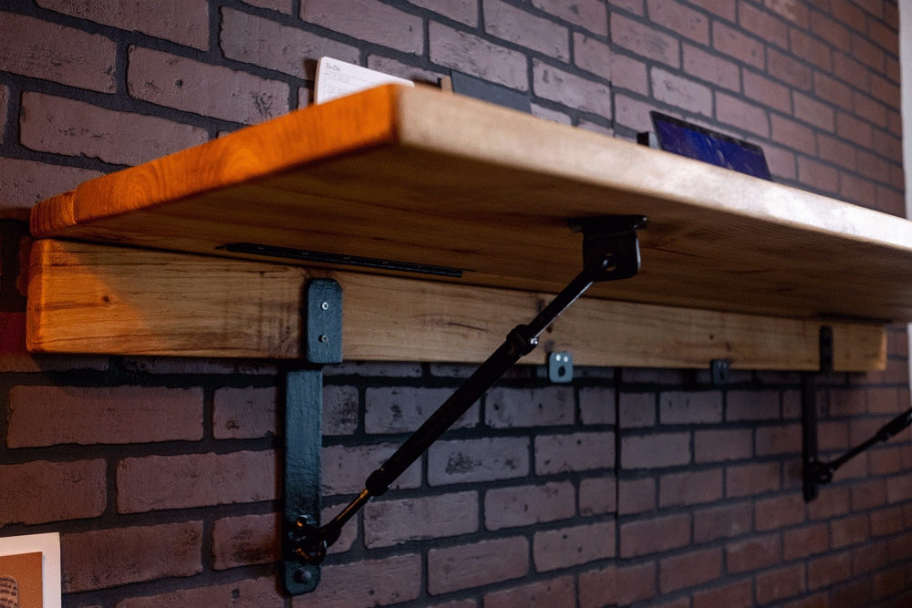 Folding Wall Desk: Gas Strut Supports and Thick Wood Slab