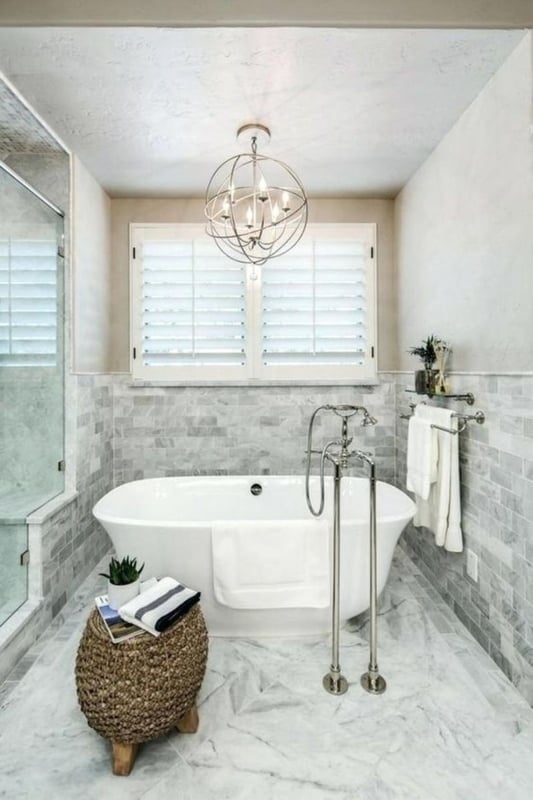 Freestanding Bathtub with Orb Chandelier and Master Bath Design