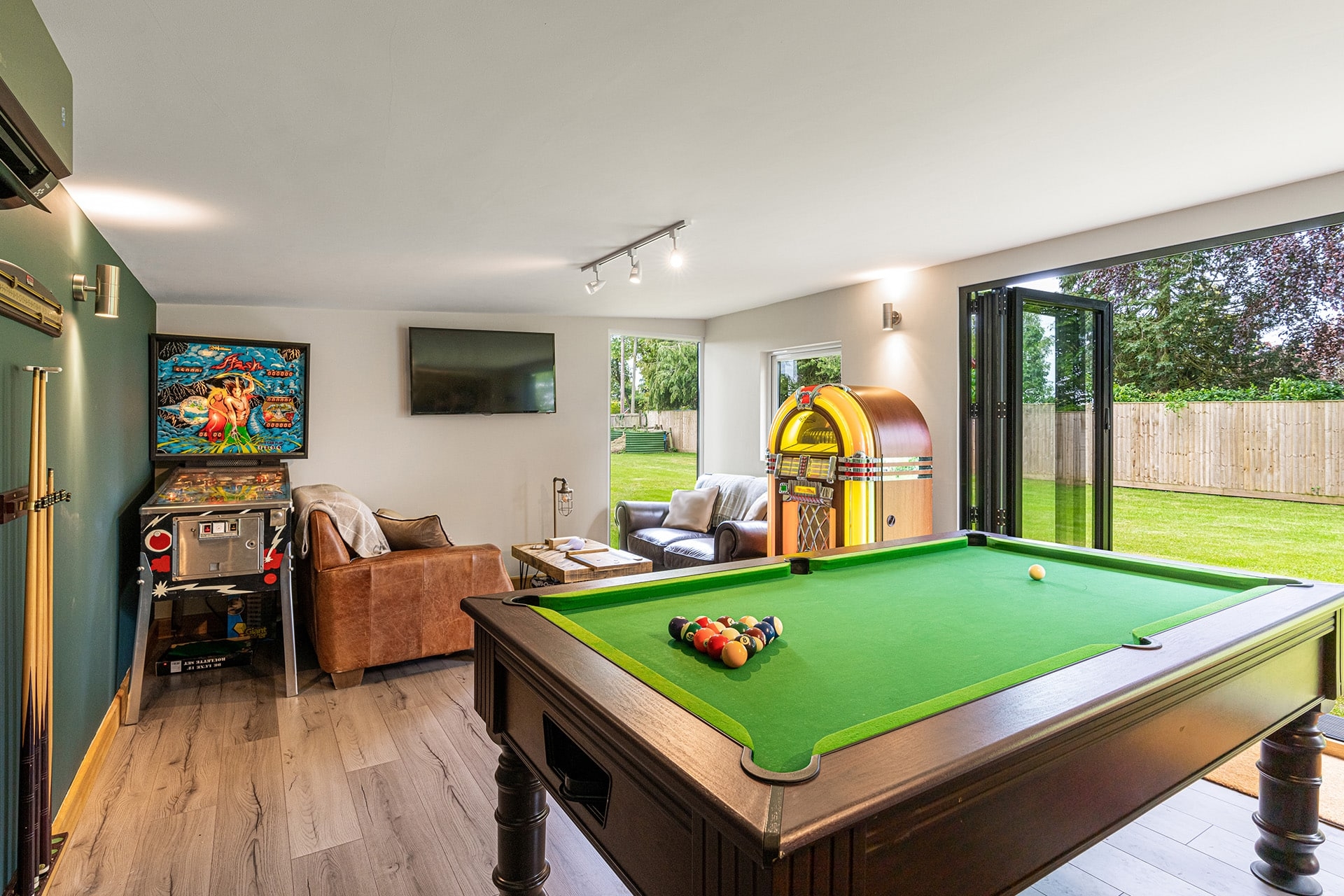Garden Room Lounge with Bifold Doors for an Indoor Outdoor Game Room