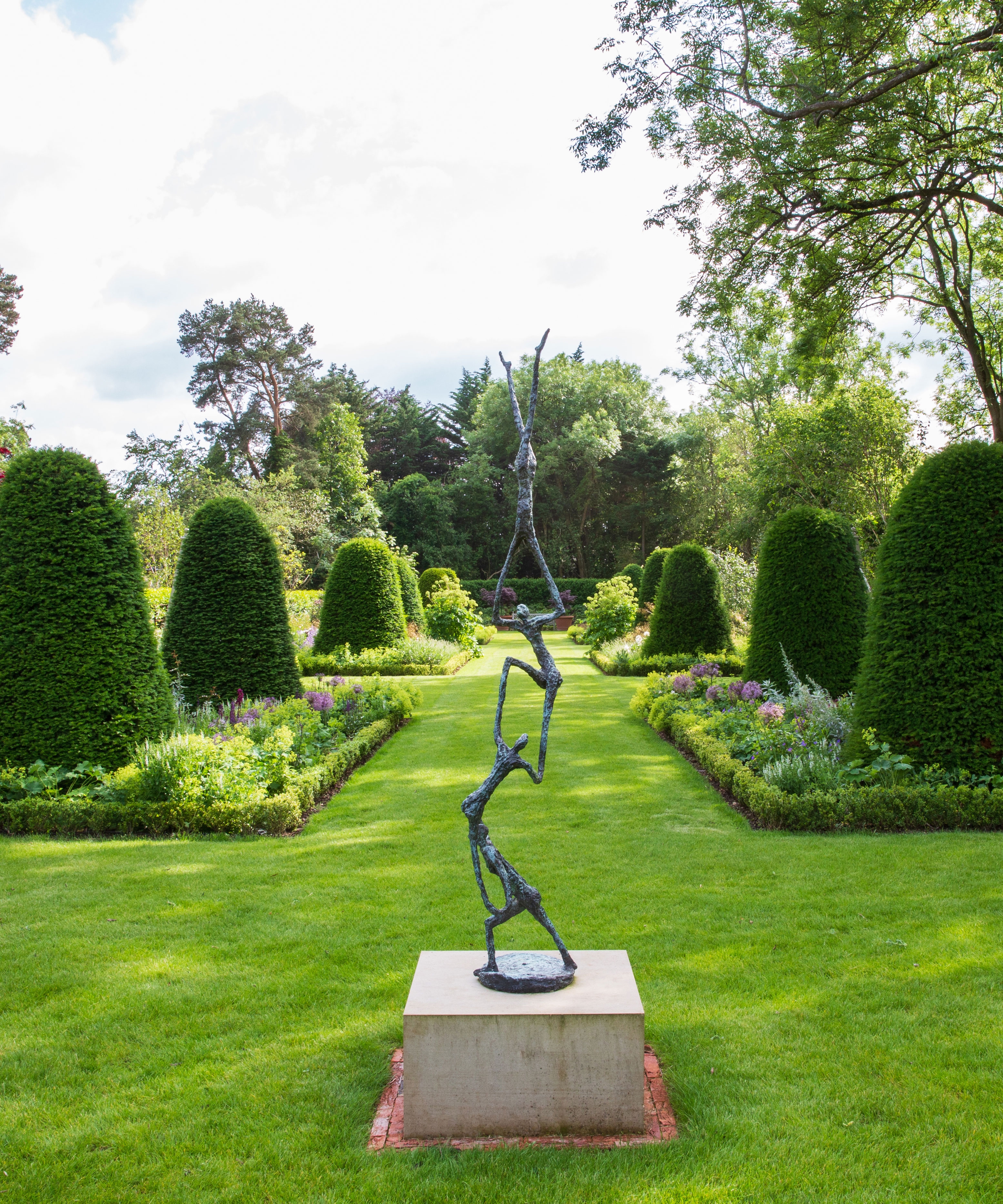 Garden Sculpture on Stone Like Pedestal Formal Statue Art