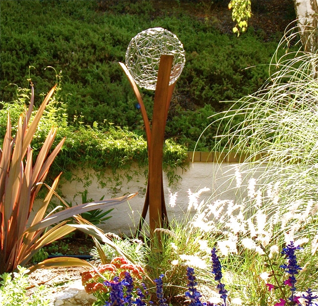 Garden Sculpture with Rusty Metal Stalks Oxidized Focal Point