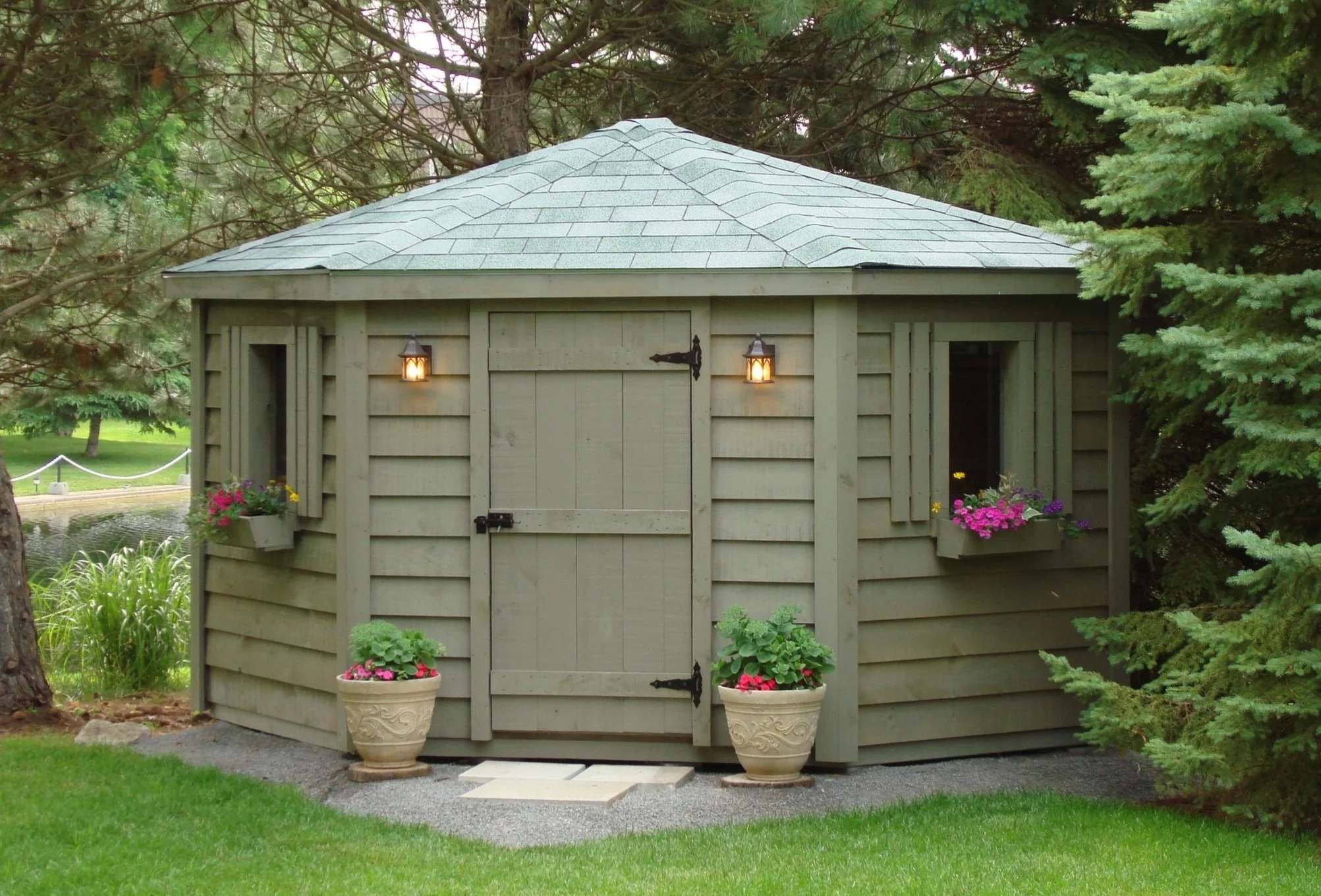 Garden Shed with corner-hugging silhouette and window boxes