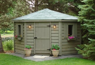 Garden Shed with corner-hugging silhouette and window boxes