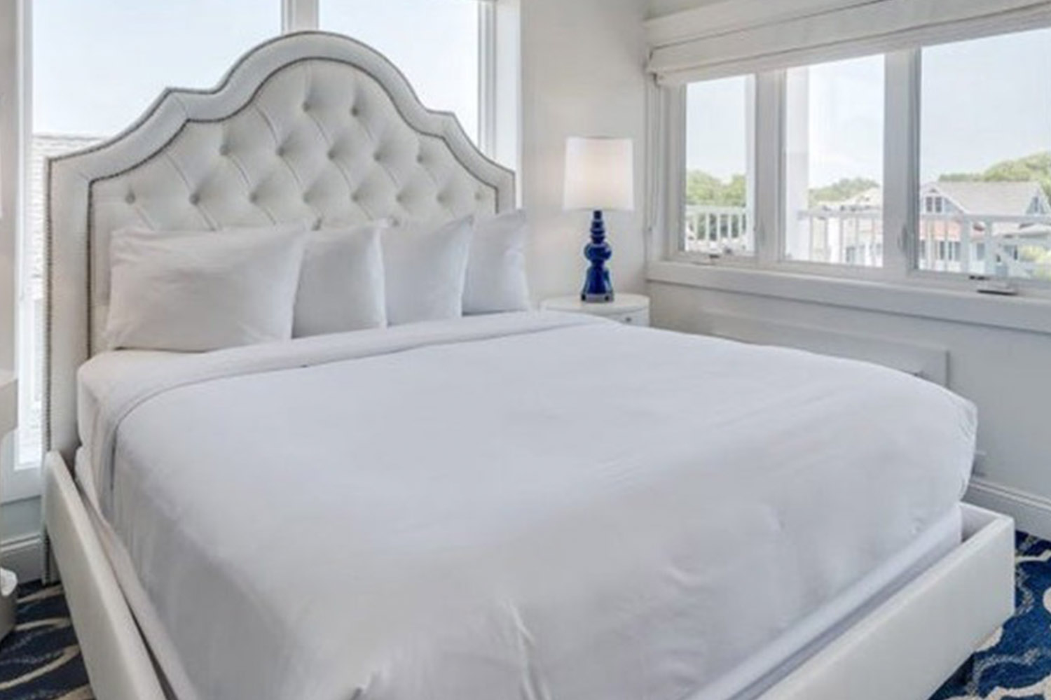 Headboard with Nailhead Trim and White Tufted Curves