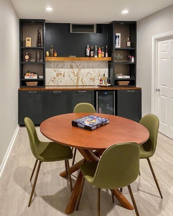 Home Bar Set with Matte Black Cabinetry and Olive Green Chairs