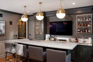 Home Bar with Brass Globe Pendants and Charcoal Textured Walls