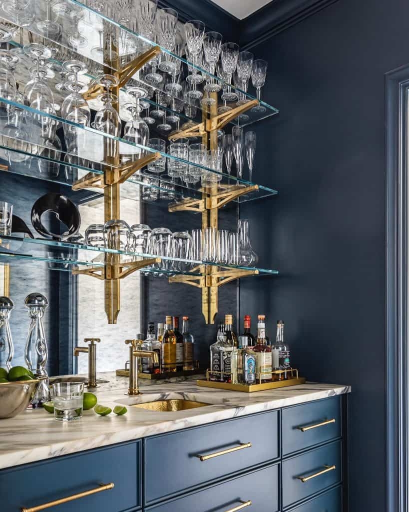 Home Bar with Industrial Brass Brackets and Navy Shaker Cabinetry