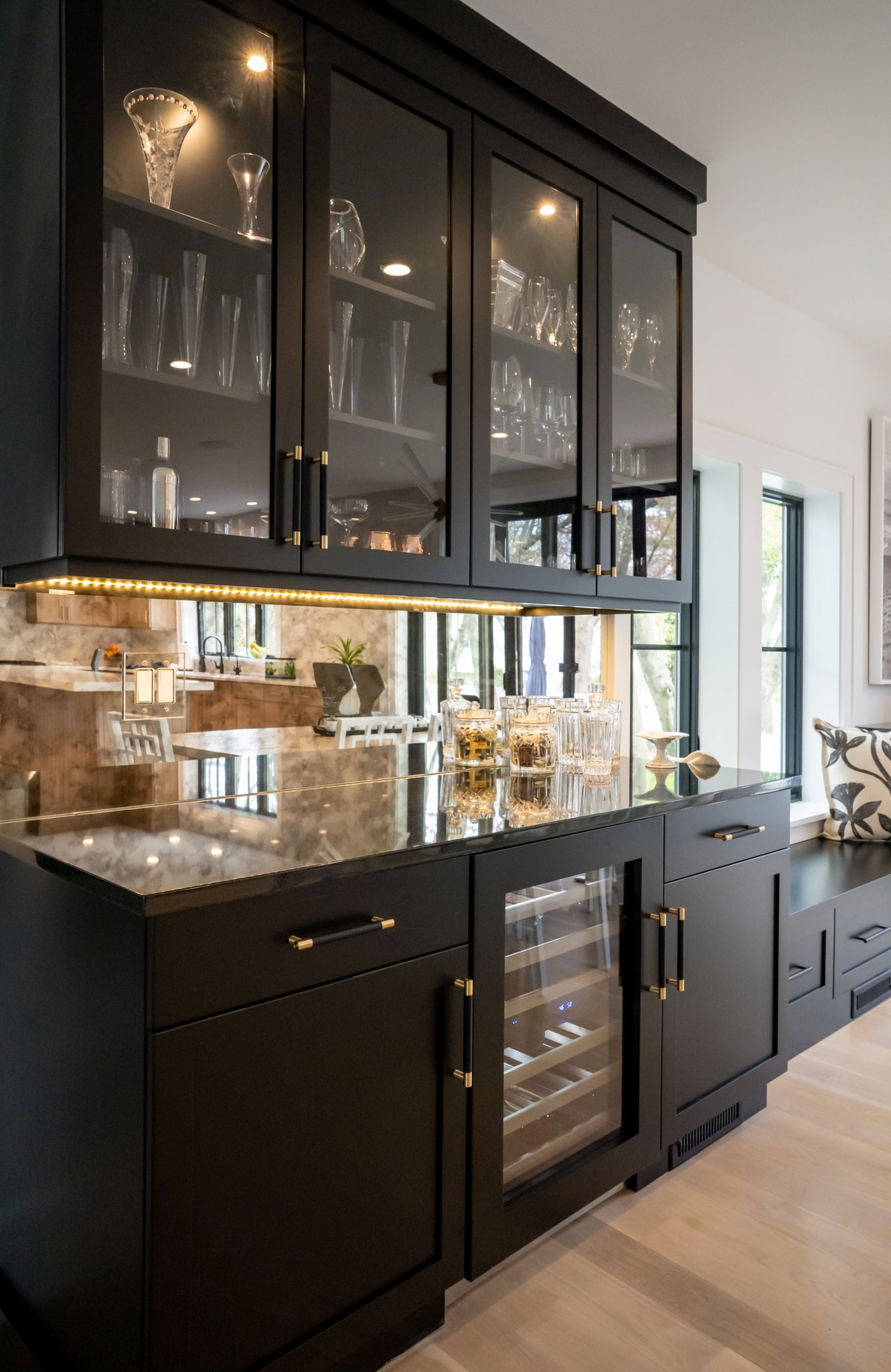 Home Bar with Window Seat and Transitional Black Cabinetry