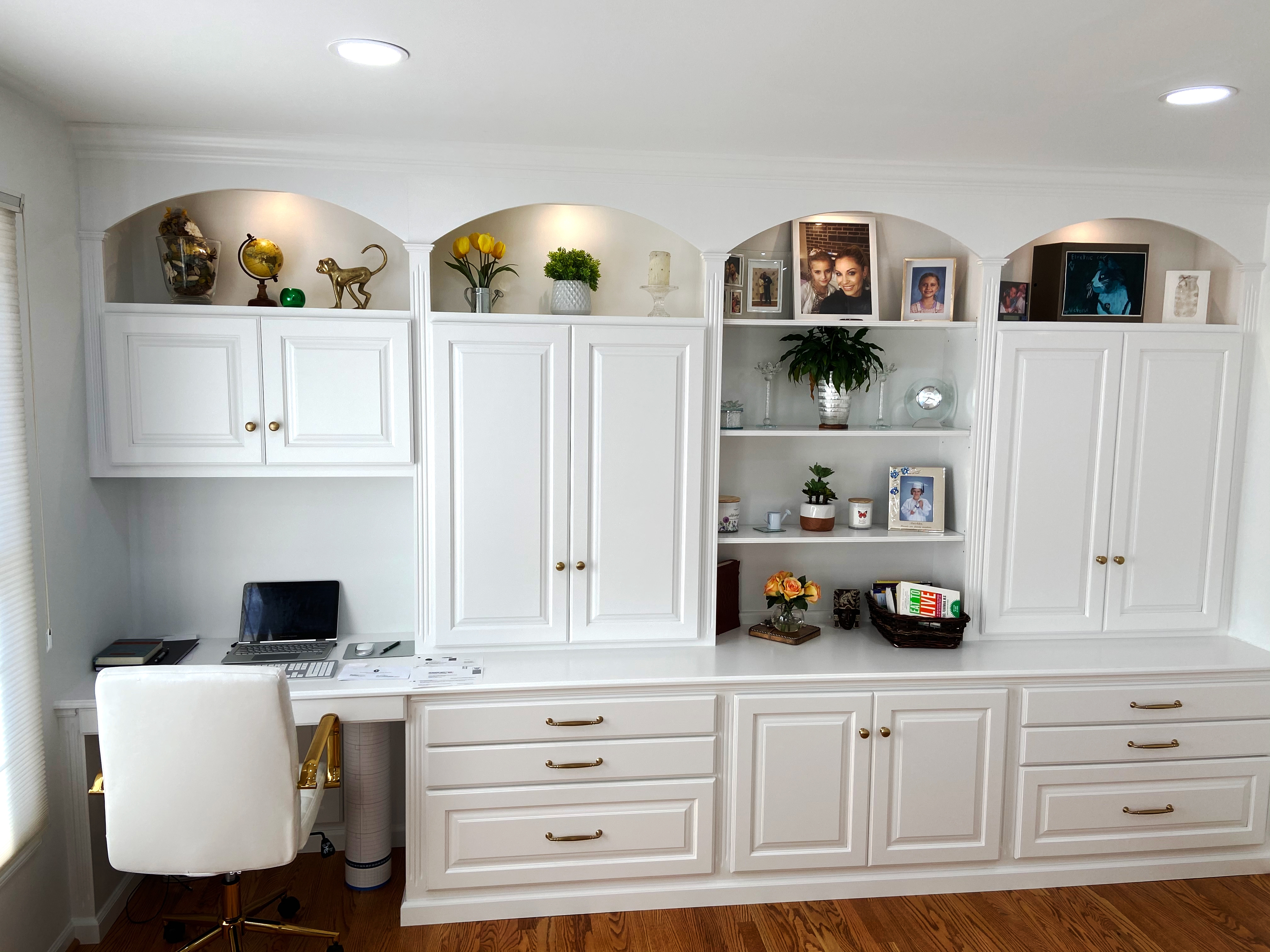 Home Office Cabinetry with Arched Niches and Brass Hardware
