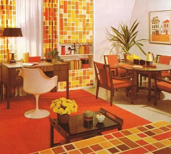 Home Office Featuring Tulip Style Chair and Orange Shag Carpet