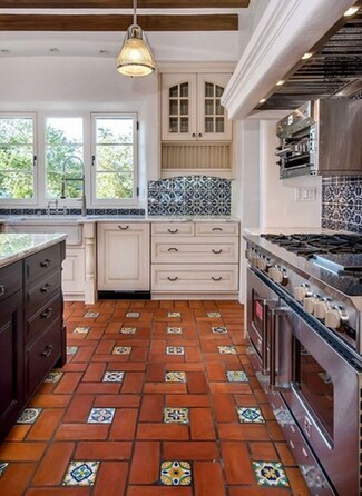 Kitchen Cabinetry Decorative Tile Insets and Wood Beams