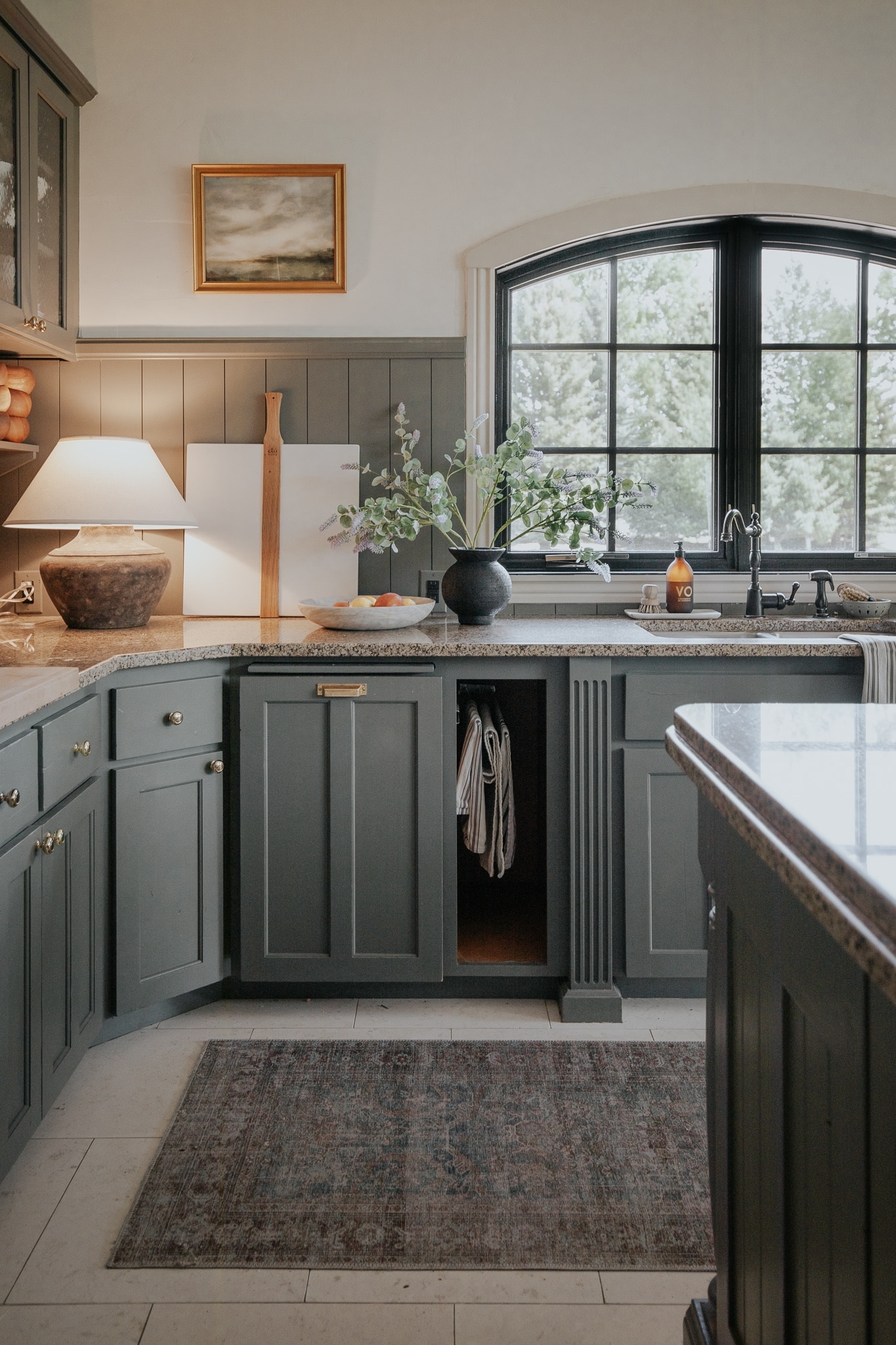 Kitchen Countertop Lamp Muted Green Cabinets Arched Window
