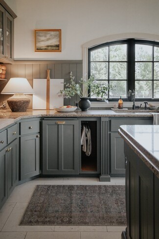 Kitchen Countertop Lamp Muted Green Cabinets Arched Window