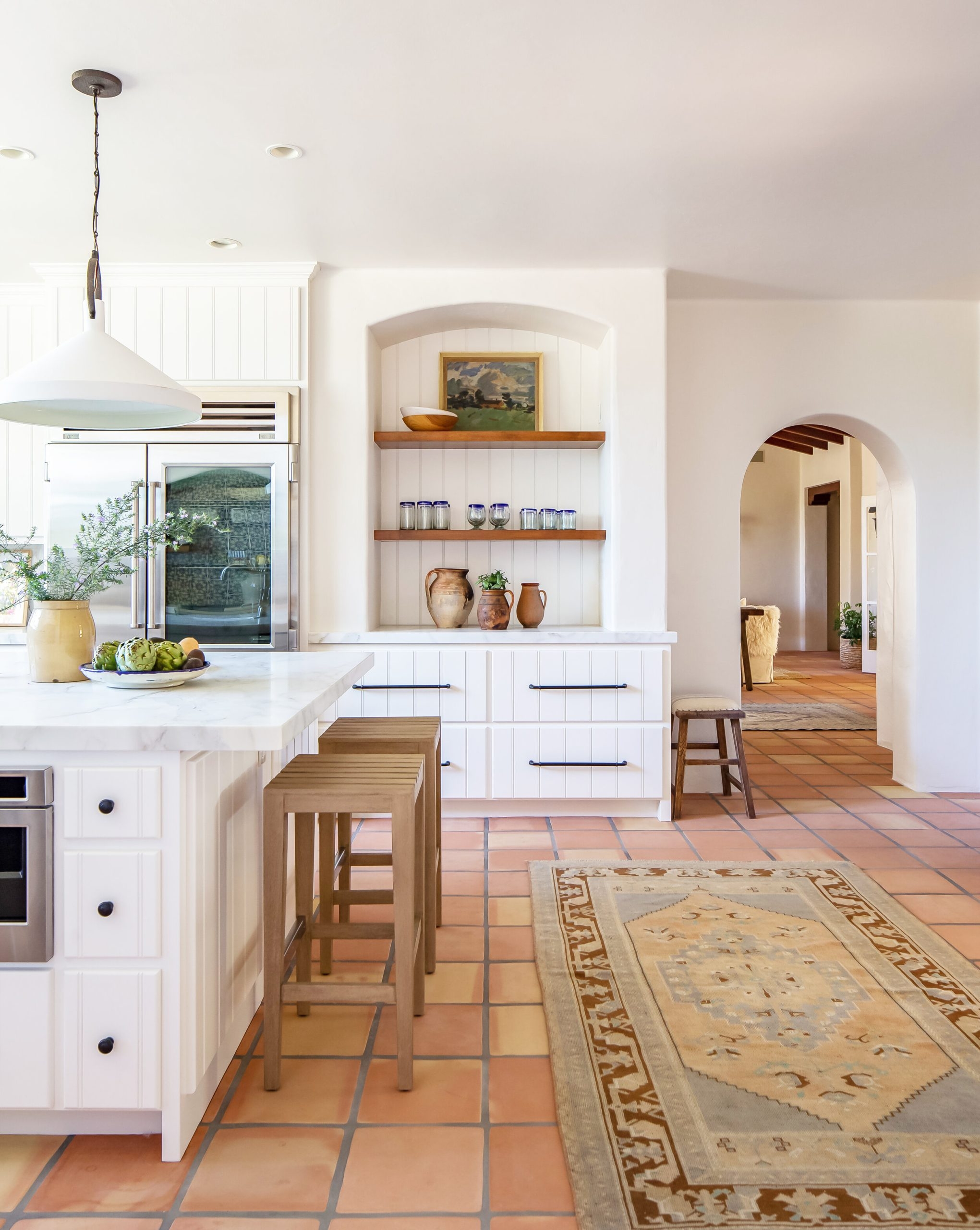 Kitchen Island Arched Alcove and Terracotta Floor