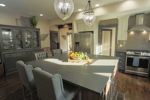 Kitchen Island with Oversized Quartz Top and Tufted Seats
