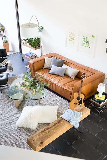 Leather Sofa with Glass Top Table and Chunky Texture