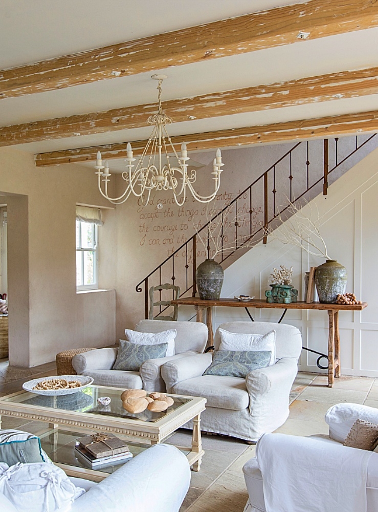 Living Room Set highlighting Script Wall Art and Ornate Chandelier