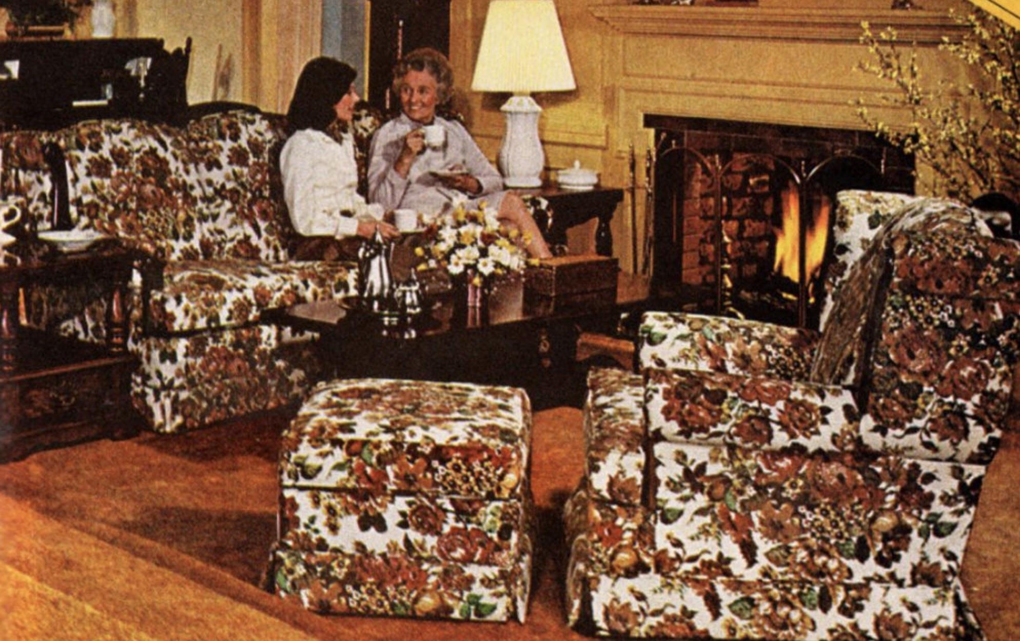 Living Room Set: Matching Floral Upholstery and Warm Hearth