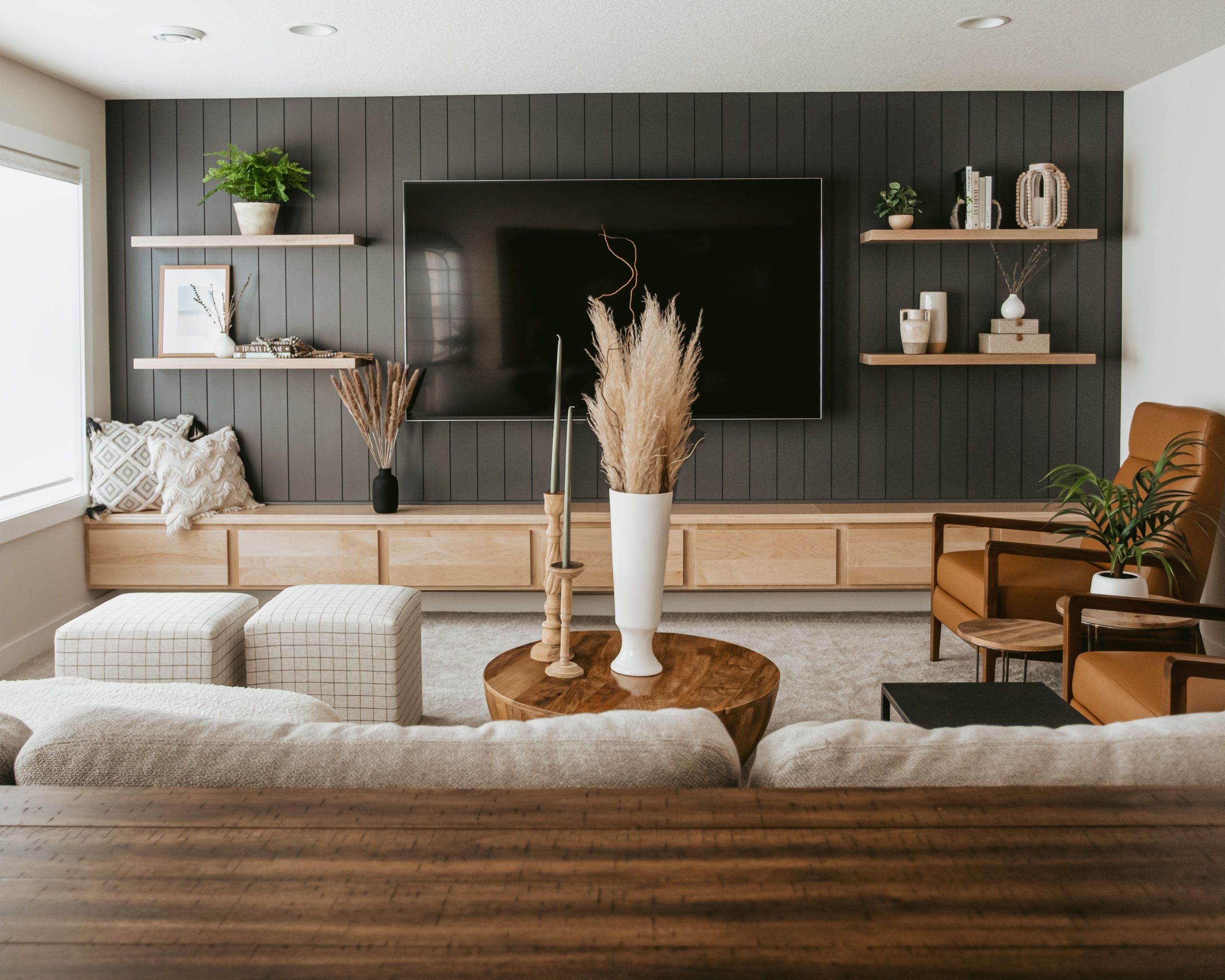 Living Room Set Vertical Wood Paneling and Black Panel Accent Wall