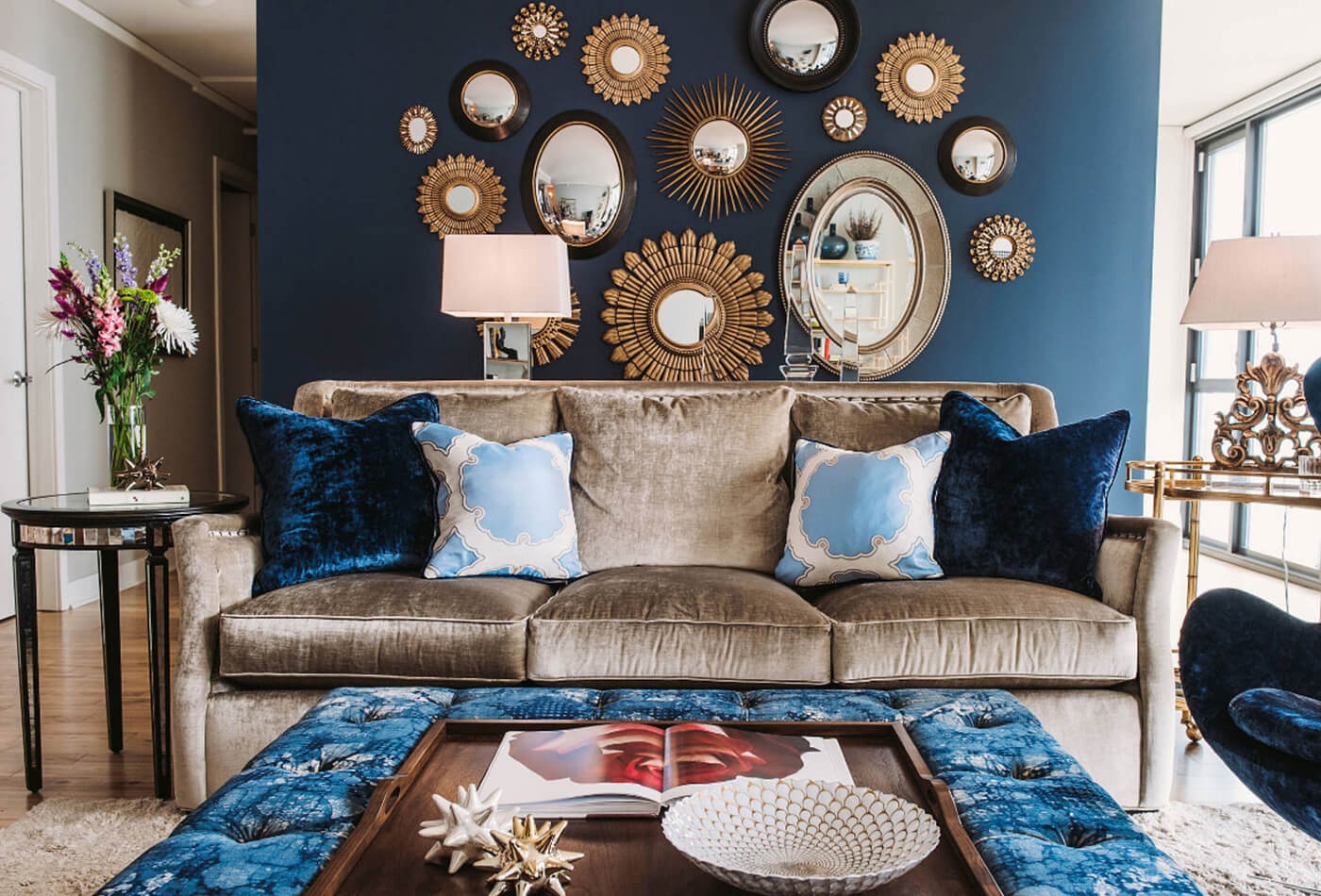 Living Room Vignette Navy Accent Wall and Sunburst Mirror Gallery