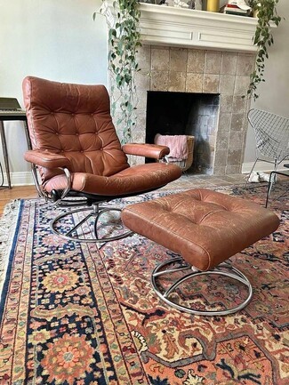 Lounge Chair Circular Chrome Base Distressed Cognac Tufted Seat