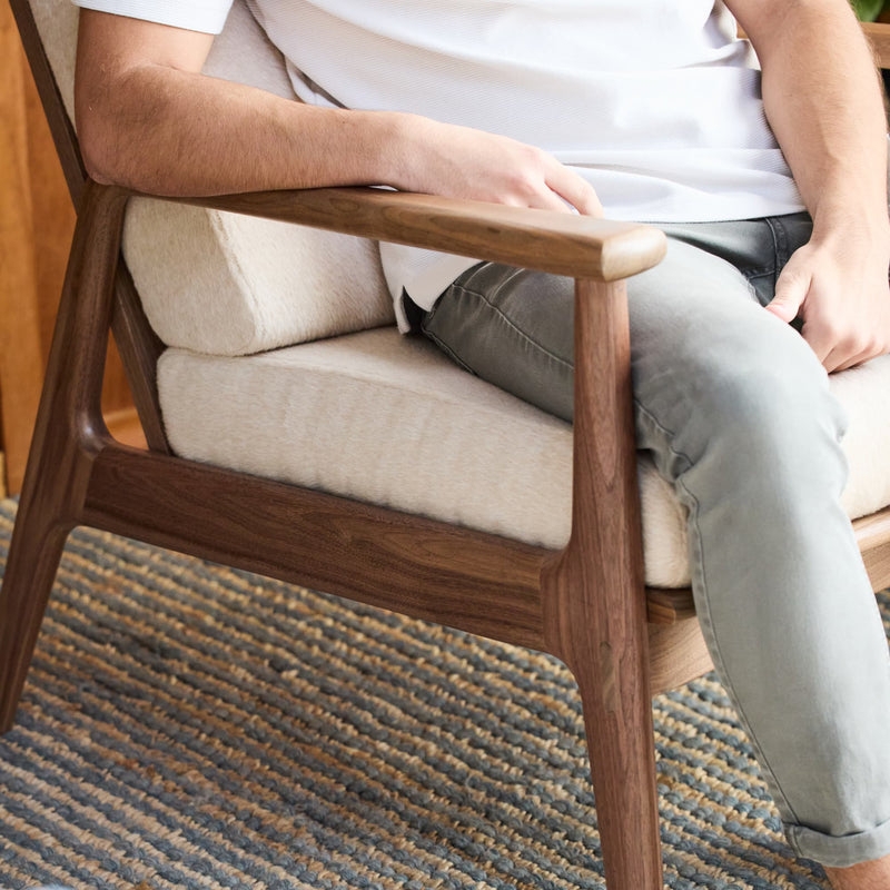 Lounge Chair Using Sculptural Walnut Frame and Cream Boucle