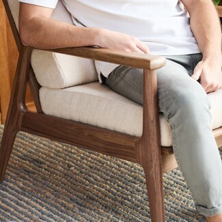 Lounge Chair Using Sculptural Walnut Frame and Cream Boucle