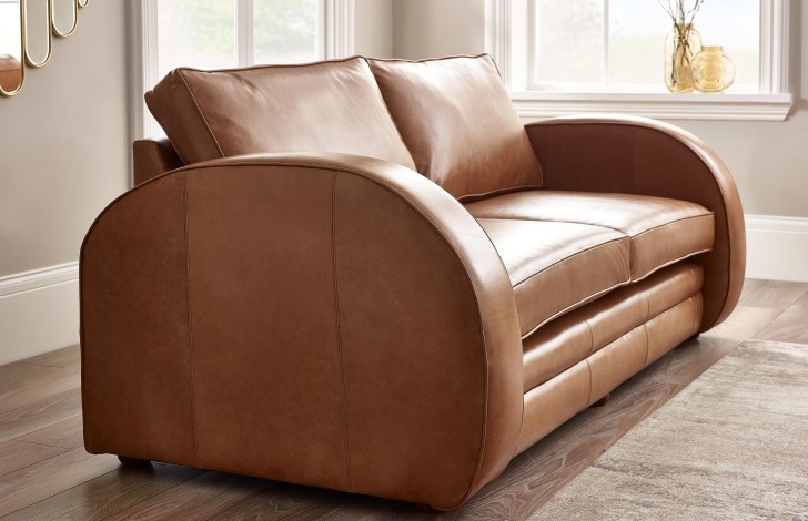 Loveseat featuring Art Deco Silhouette and Cognac Brown Seating