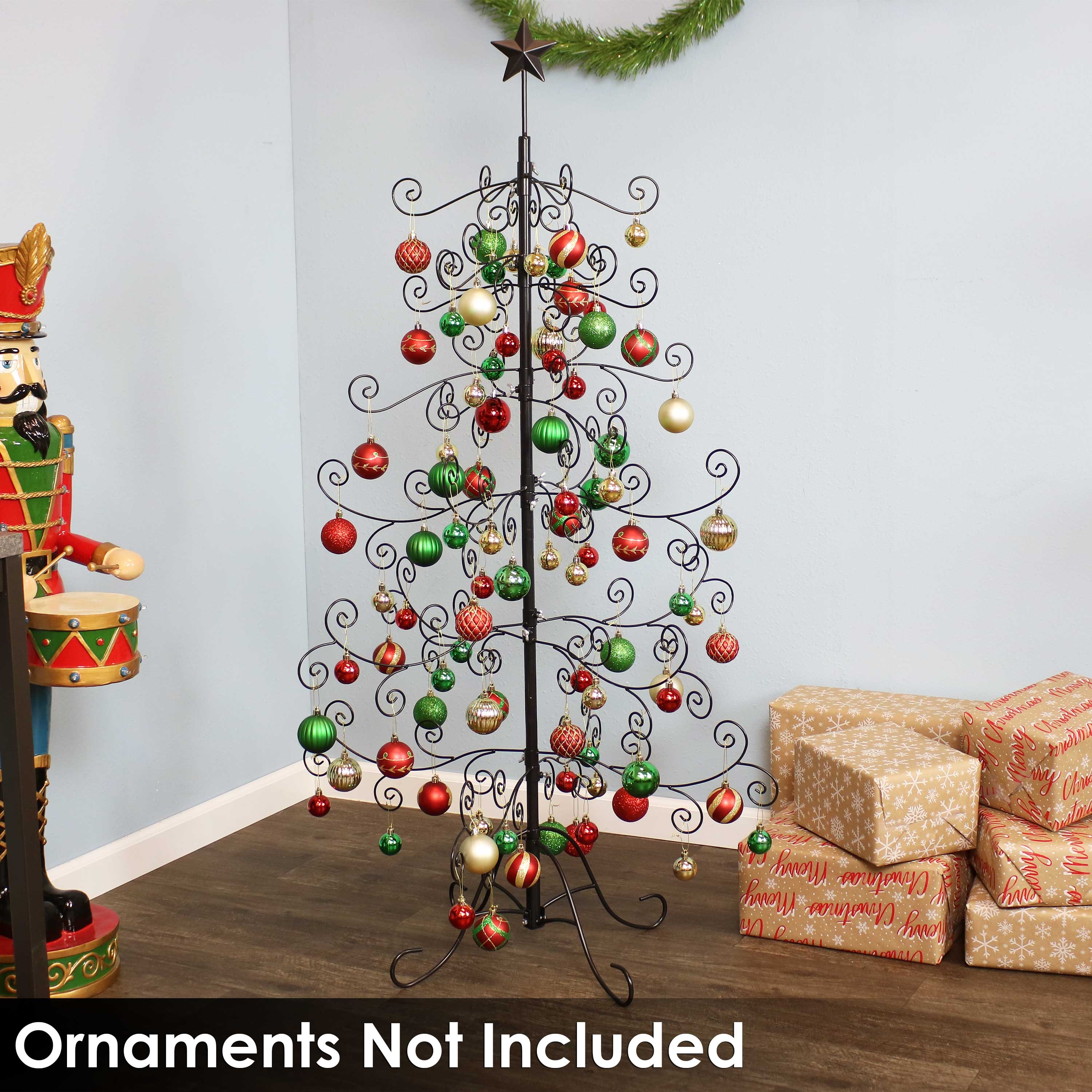 Metal Christmas Tree Featuring Scroll Work Branches And Star