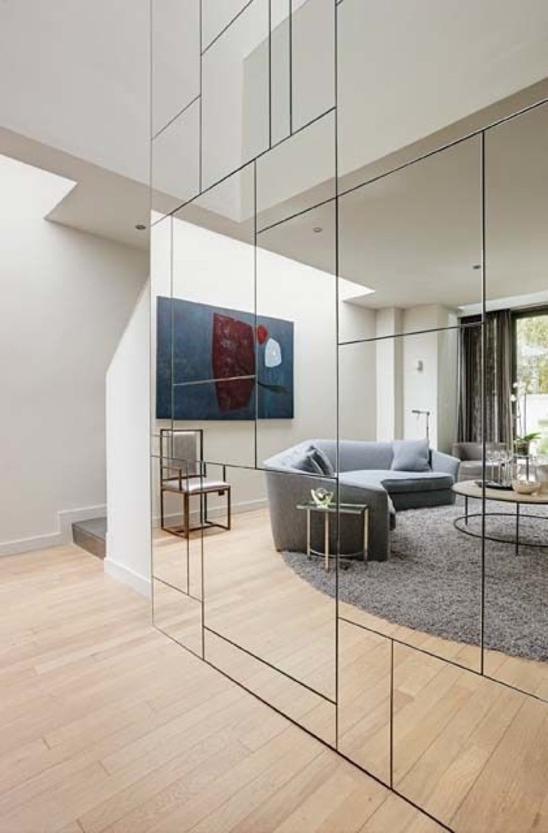 Mirrored Wall with Asymmetric Grid for Modern Paneled Decor