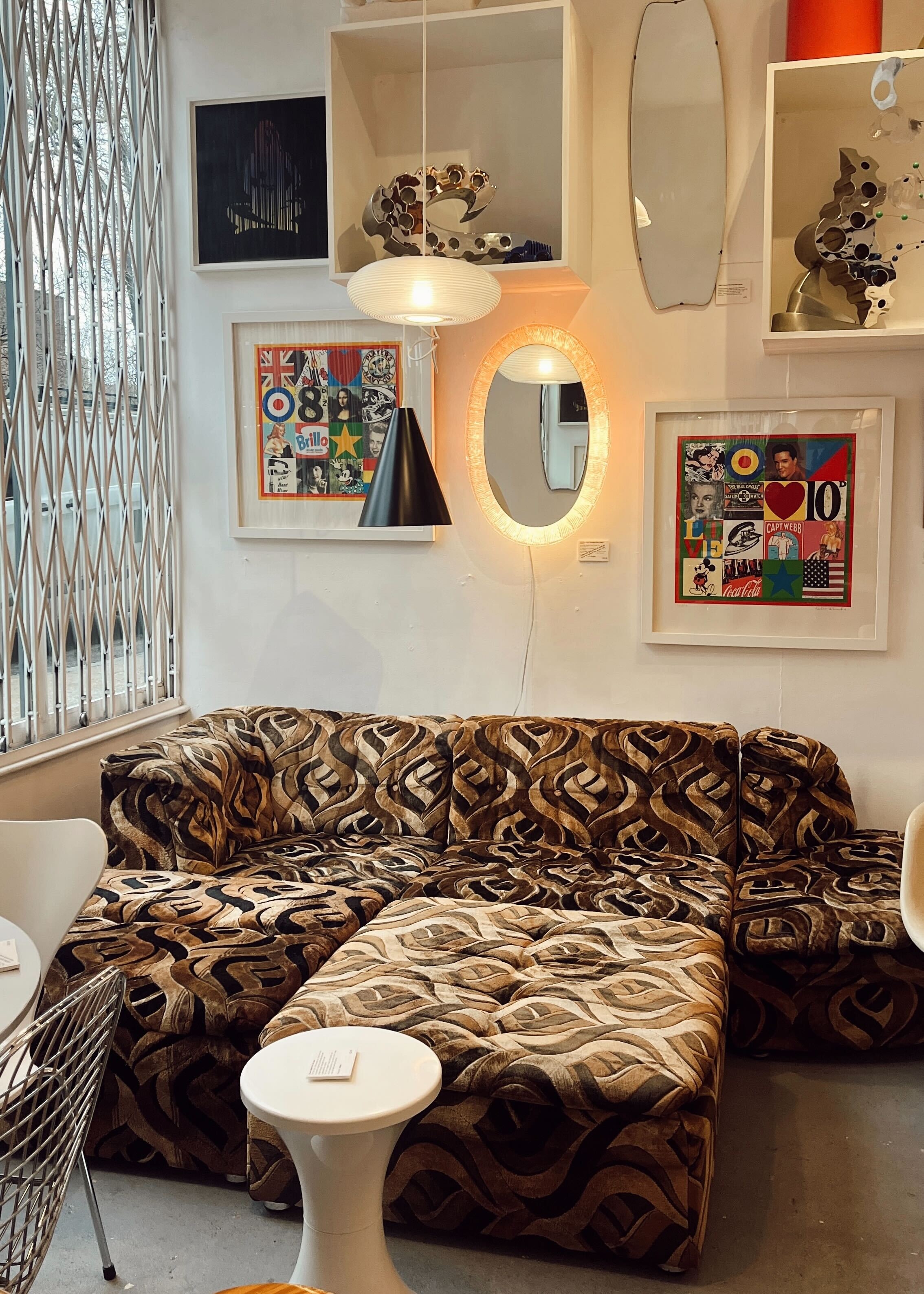 Modular Sectional Sofa With Swirling Pattern and Glowing Mirror
