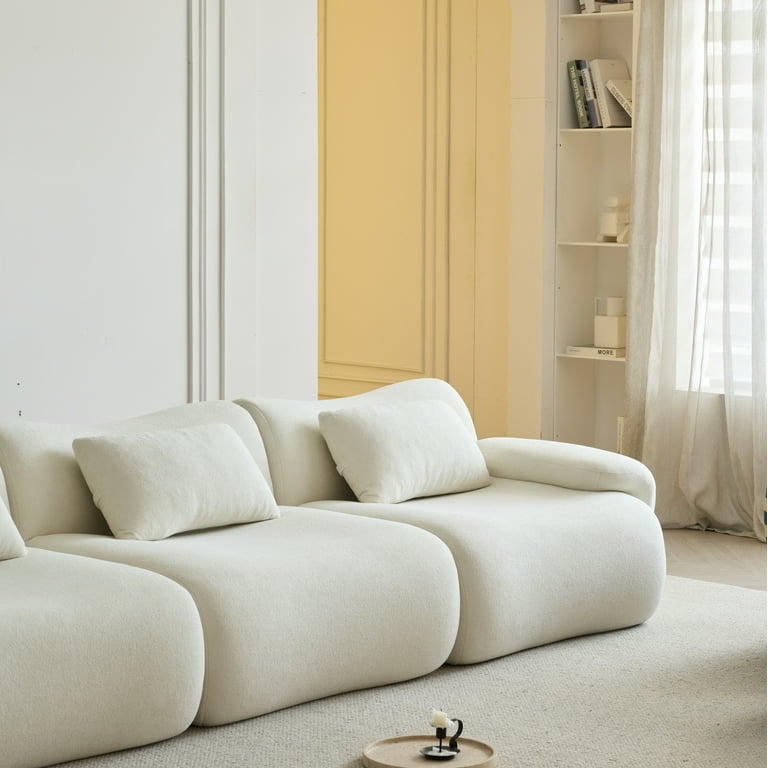 Modular Sofa with Creamy White Bulbous Form and Soft Sections