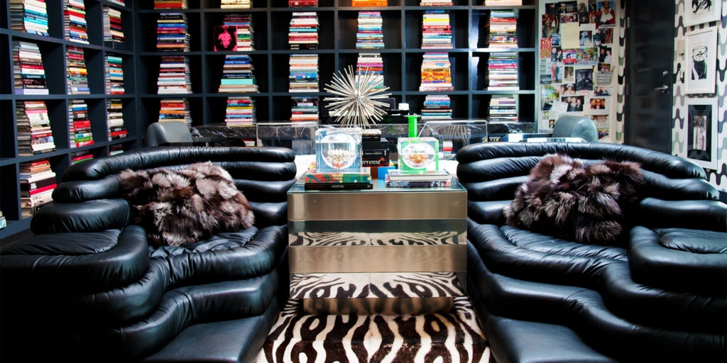 Modular Sofa With Tiered Cushions and Zebra Print Hide Rug