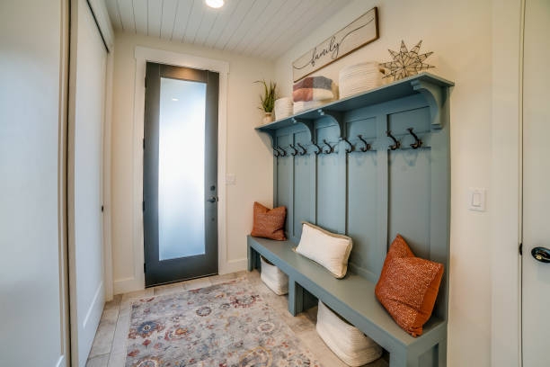 Mudroom Unit with Dusty Blue Cabinetry and Frosted Glass Door