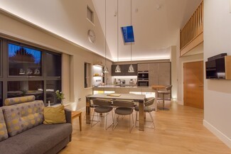 Open Plan Living Space with integrated skylight and cove light