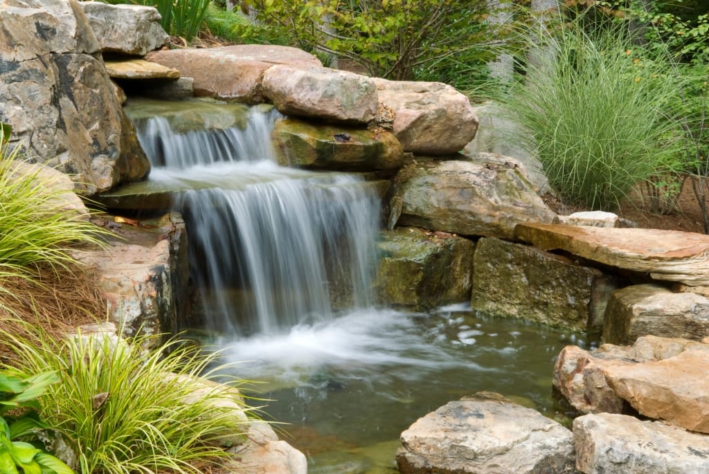 Outdoor Waterfall: Jagged Rock Layers Rustic Design