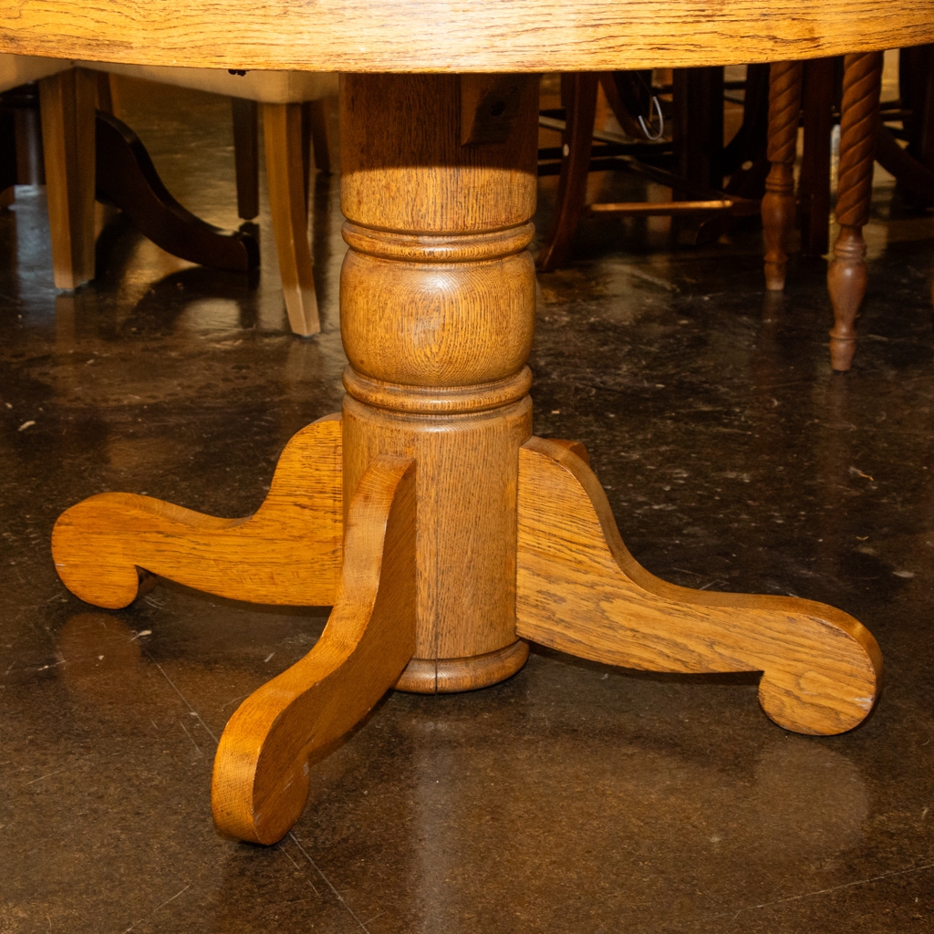 Pedestal Dining Table: Scroll feet and antique turned column
