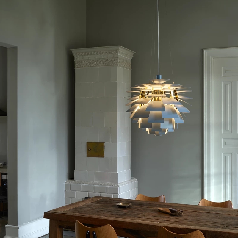 Pendant Light: Multi Tiered Shades and Dusty Blue Wall