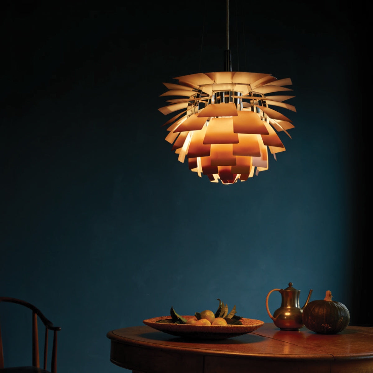 Pendant Light: Warm Copper Finish and Sculptural Form