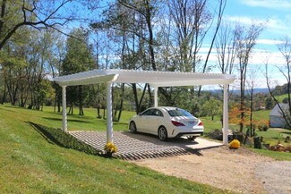 Pergola Carport with Fluted Columns and White Driveway Pergola