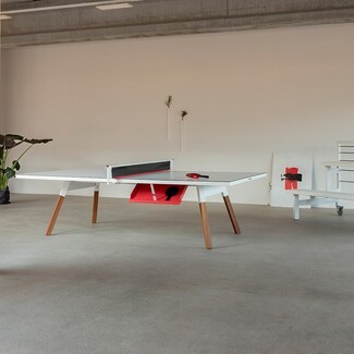 Ping Pong Table Equipped With Red Storage Shelf and White Wood